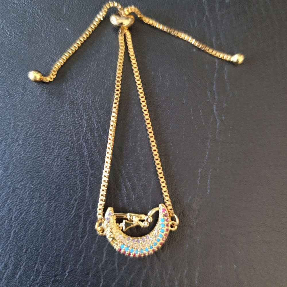 NEW- Half a Moon  gold tone bracelet